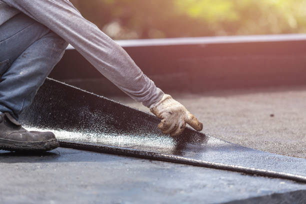 Professional Basement Waterproofing technician working in Malta, OH